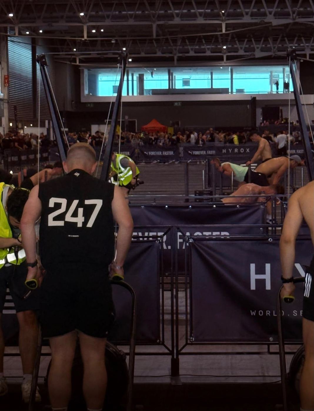 Racing on the ski erg at a Hyrox event